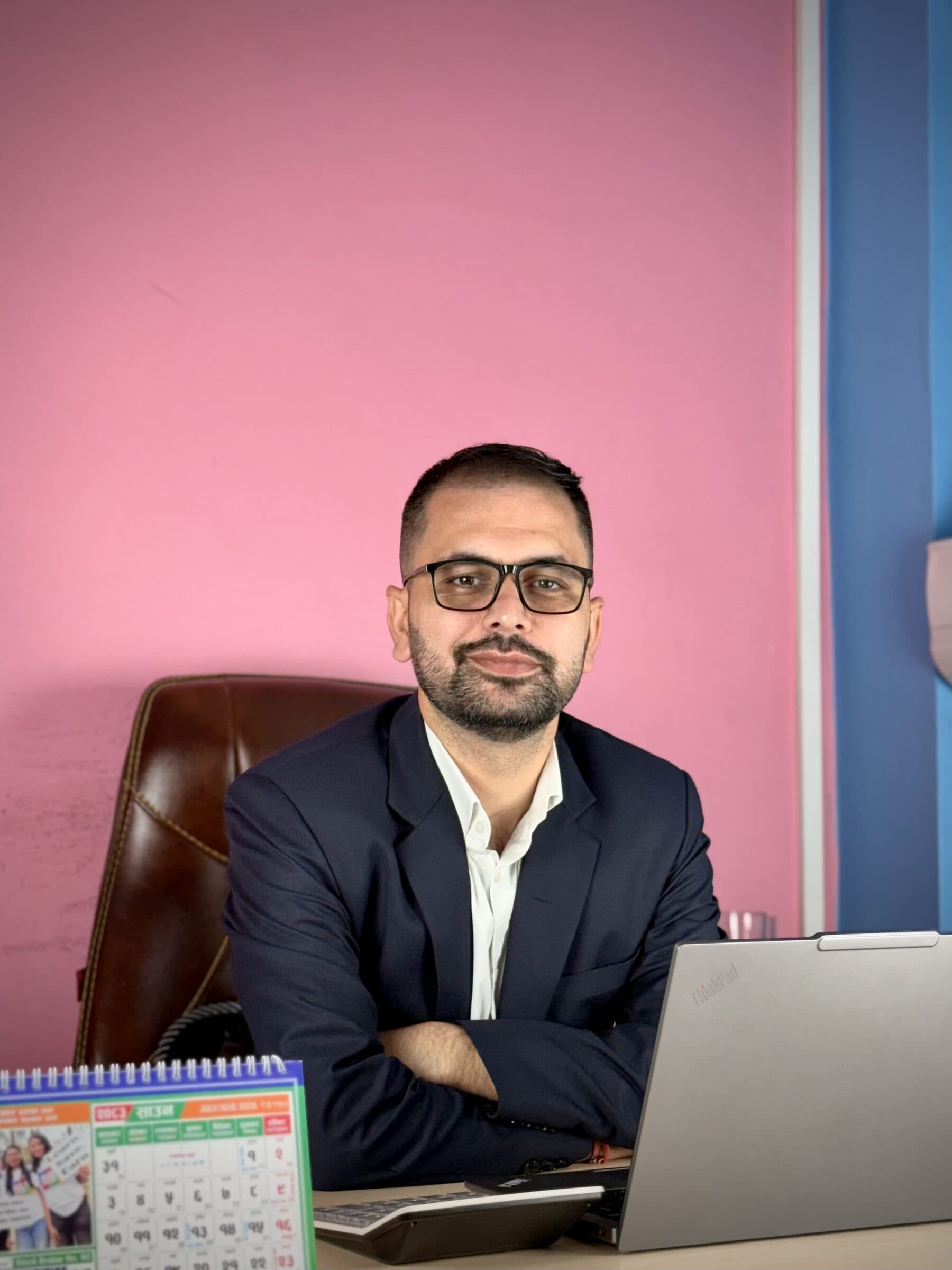 B3S team member at his desk