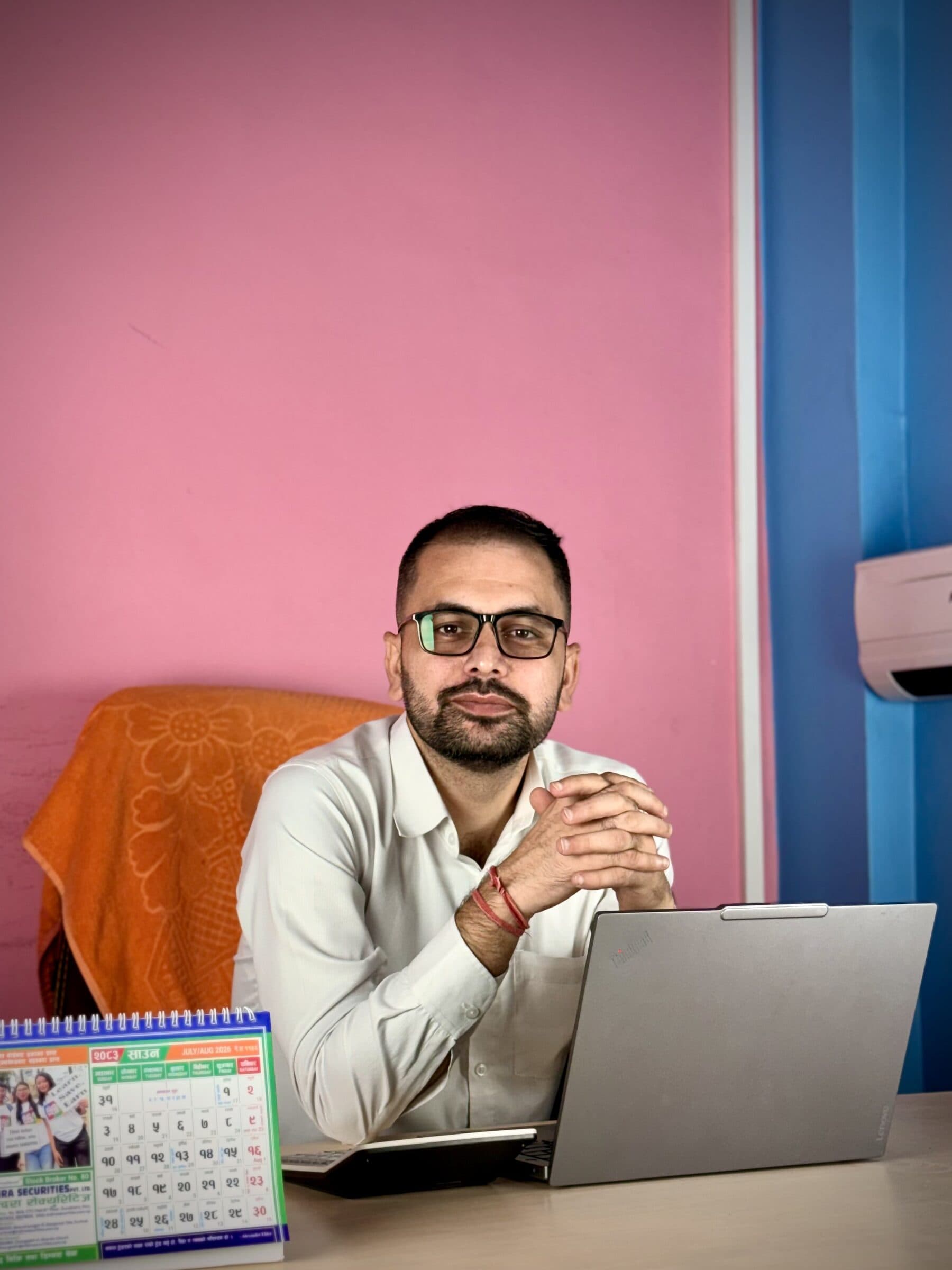 B3S team member at his desk